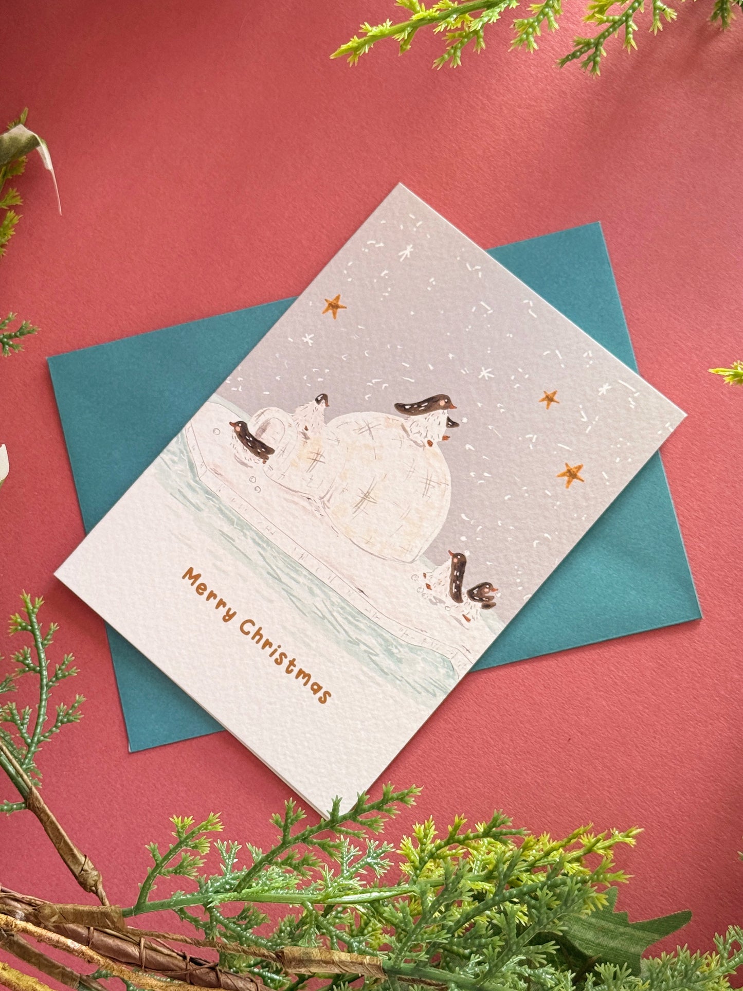Penguin igloo Christmas Card