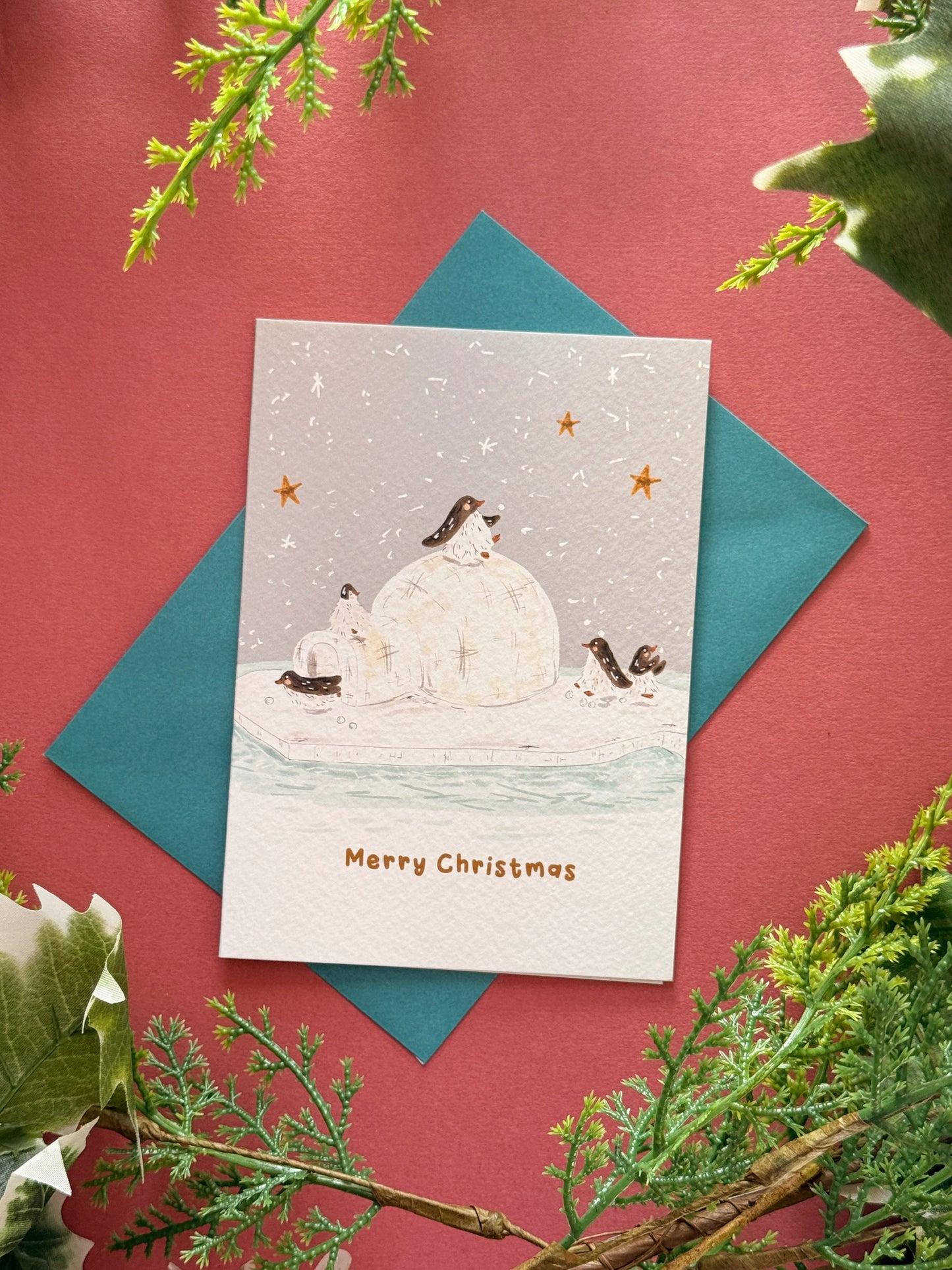 Penguin igloo Christmas Card